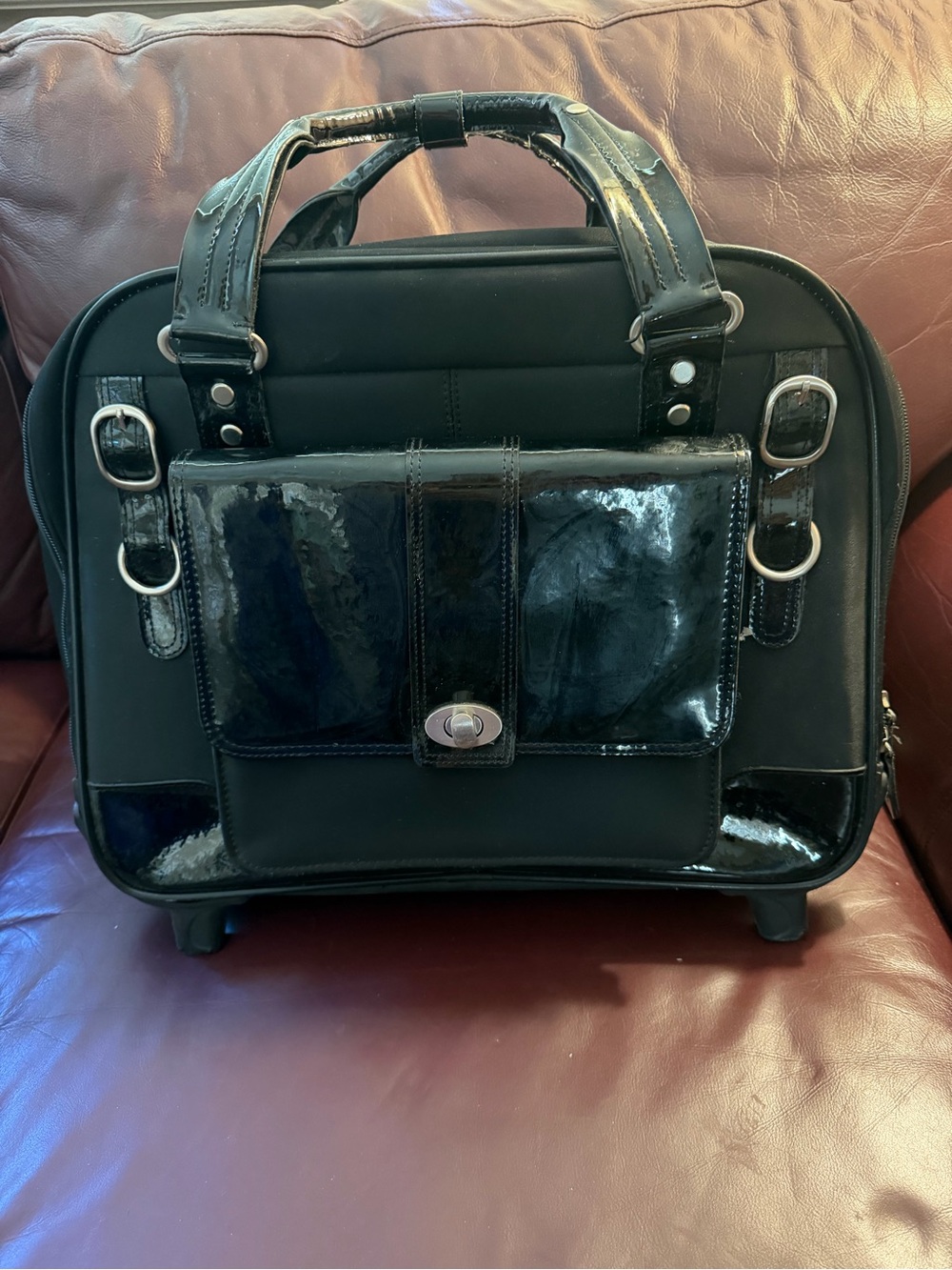 FranklinCovey Black Women's Briefcase Bag on rollers. Gloss Accent